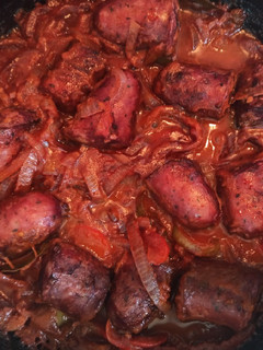 Una foto de Chorizos al vino tinto