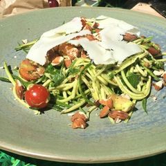 A picture of Pesto courgetti salad with feta and almonds.