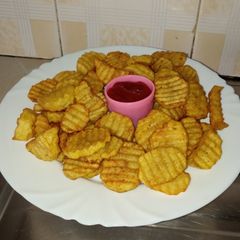 A picture of Spicy crinkled potatoes🤤.