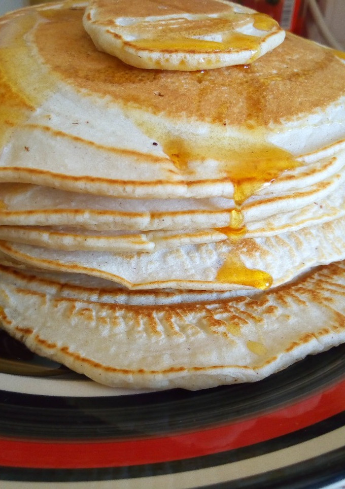 A picture of American Pancakes With Chocolate Chips.
