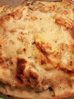 Una foto de Gratinado de Brócoli, Coliflor y Gambas