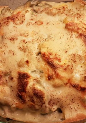 Una foto de Gratinado de Brócoli, Coliflor y Gambas