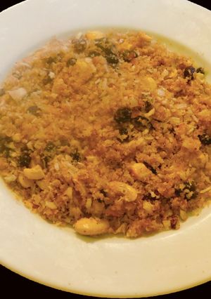 A picture of Aval puttu -Sweet dessert with flattened rice.