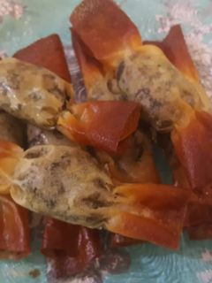 Une photo de Bonbons feuilleté aux escargots et champignons