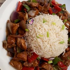 A picture of Chicken in Black Pepper Sauce with Steamed Basmati Rice.