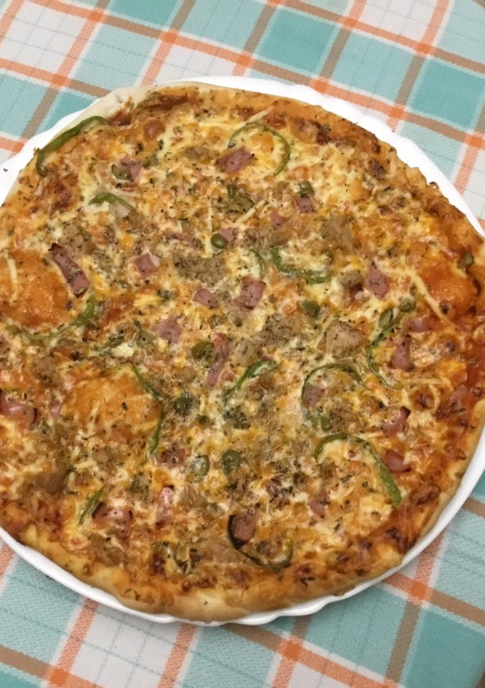 Una foto de Pizza de los domingos🍕🍕🍕