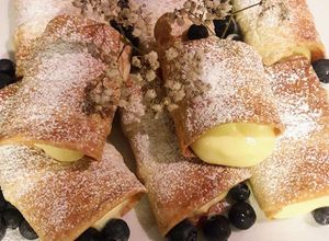 Una foto de Conitos rellenos con crema pastelera