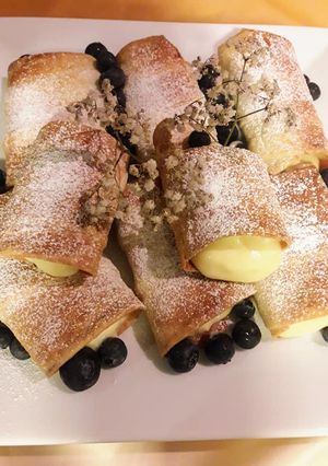 Una foto de Conitos rellenos con crema pastelera