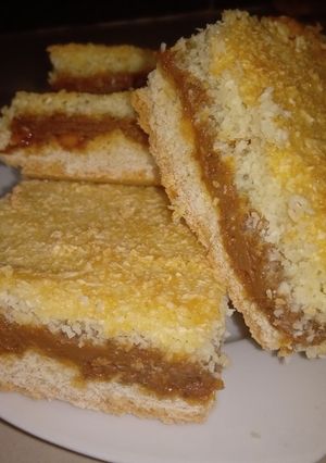 Una foto de Cuadrados de Coco y Dulce de leche