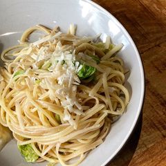 A picture of Savoy cabbage, yellow courgette and anchovy oil pasta.