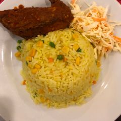 A picture of Fried rice well  garnished.