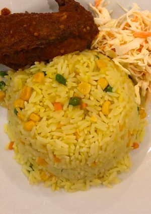 A picture of Fried rice well  garnished.