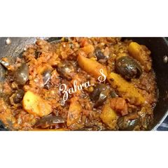 A picture of Small whole brinjal and aloo sabzi.