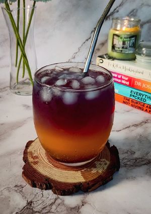 A picture of Mango and Pea flower Mocktail.
