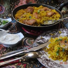 A picture of Turmeric Rice with Chicken  کته زردچوبه با مرغ.