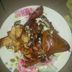 A picture of Fried chicken en veg.