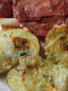 Una foto de Patatas doradas con queso