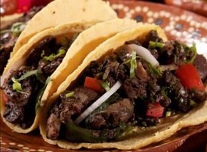 Una foto de Tacos de moronga o morcilla