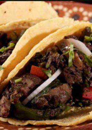 Una foto de Tacos de moronga o morcilla