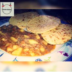 A picture of Roti with shredded chicken soup.