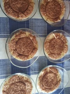 Una foto de Natillas con galleta y Canela😋