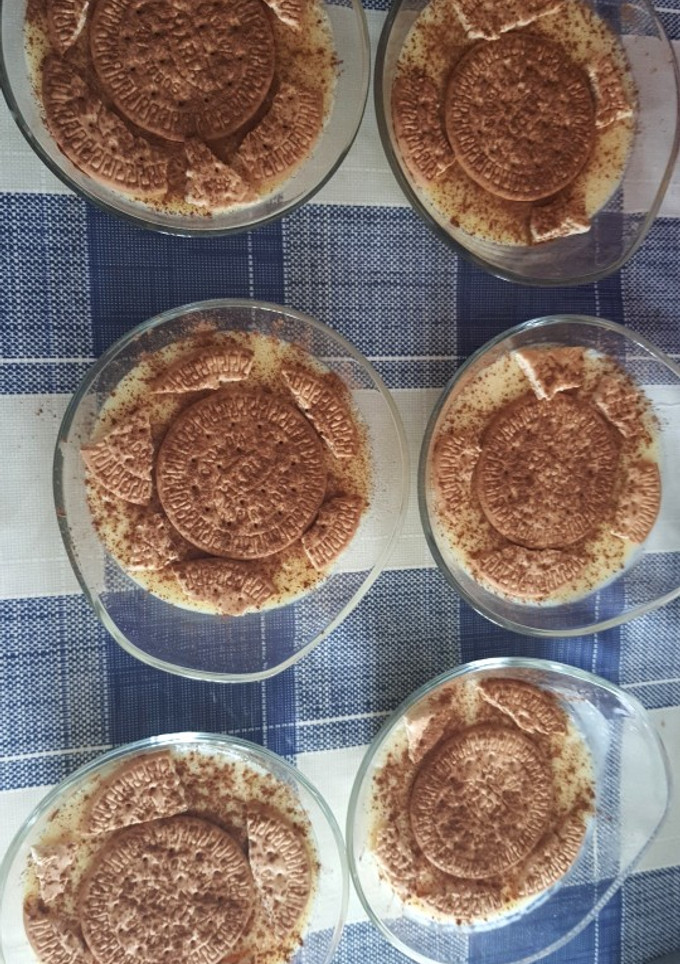 Una foto de Natillas con galleta y Canela😋