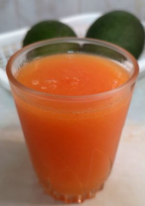 Una foto de Jugo surtido de papaya y tangelo