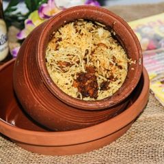 A picture of Kerala Style Claypot Chicken Biryani.