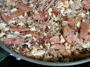 Una foto de arroz con mortadela