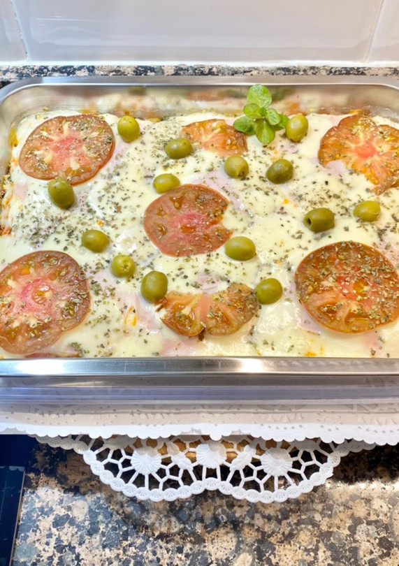 Una foto de Pizza con masa blanda, sin gluten