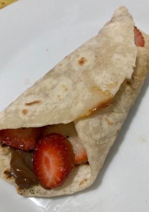 Una foto de Frutilla envueltas con dulce de leche