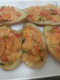 Una foto de Papa rellenas al horno al estilo vegetariano