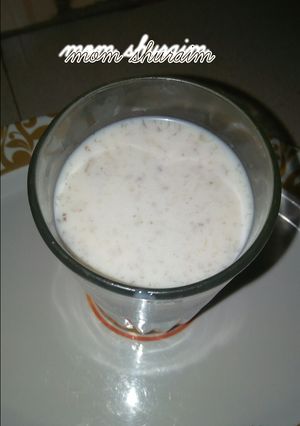 A picture of Banana and milk with honey.