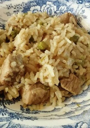 Una foto de Arroz cremoso con cerdo y espárragos