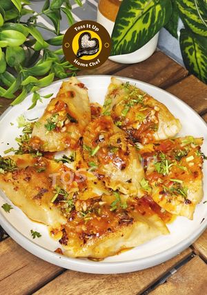 A picture of Soft, Juicy, Spicy And Healthy Chicken Momos With Homemade Chilli Garlic Oil Sauce.