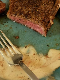 A picture of Peppercorn Steak with Sauce.