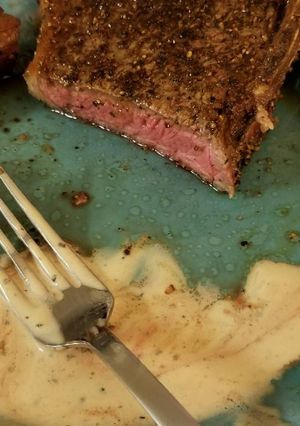 A picture of Peppercorn Steak with Sauce.