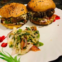 A picture of Palak Corn Burger/Whole wheat homemade buns.