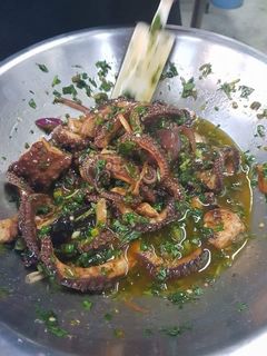 Una foto de Pulpo marinado