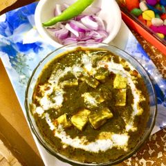 Palak paneer(Palak paneer in red gravy) A picture of Palak paneer(Palak paneer in red gravy).