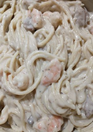 A picture of Creamy alfredo chicken and shrimp pasta.