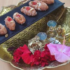 A picture of #RSC#gulabhi syrup coconut Koya balls#.