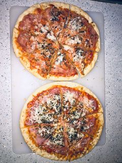 Una foto de 👩🏽‍🍳Pizza👩🏽‍🍳