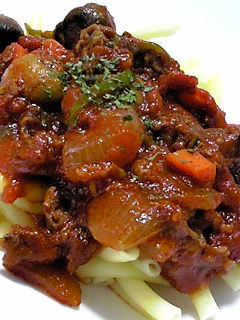 A picture of Braised Beef with Tomato Sauce.