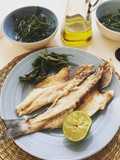 Lubina a la plancha con pimientos de Padrón y salicornia