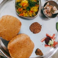 A picture of Cabbage with Multi Grain Puri.