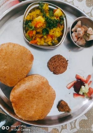 A picture of Cabbage with Multi Grain Puri.