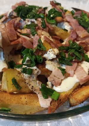 Una foto de Papas cerveceras con crema de panceta