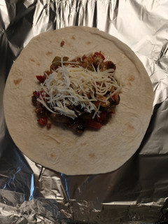 Una foto de Burritos con pimientos y huevo 🌯🌯