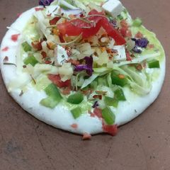 A picture of Double coated paneer & veggies uttapam.
